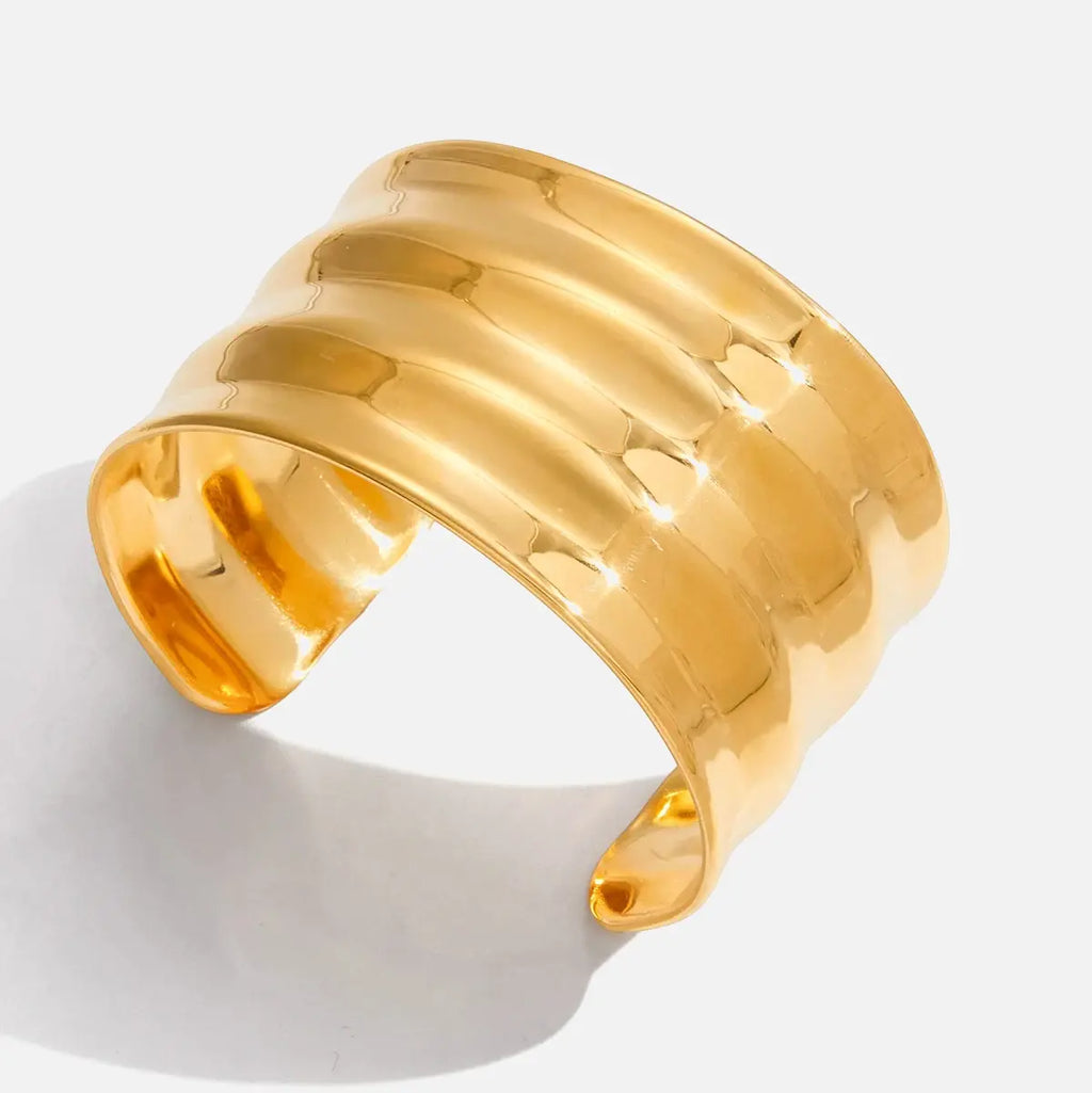 Waved statement bangle
