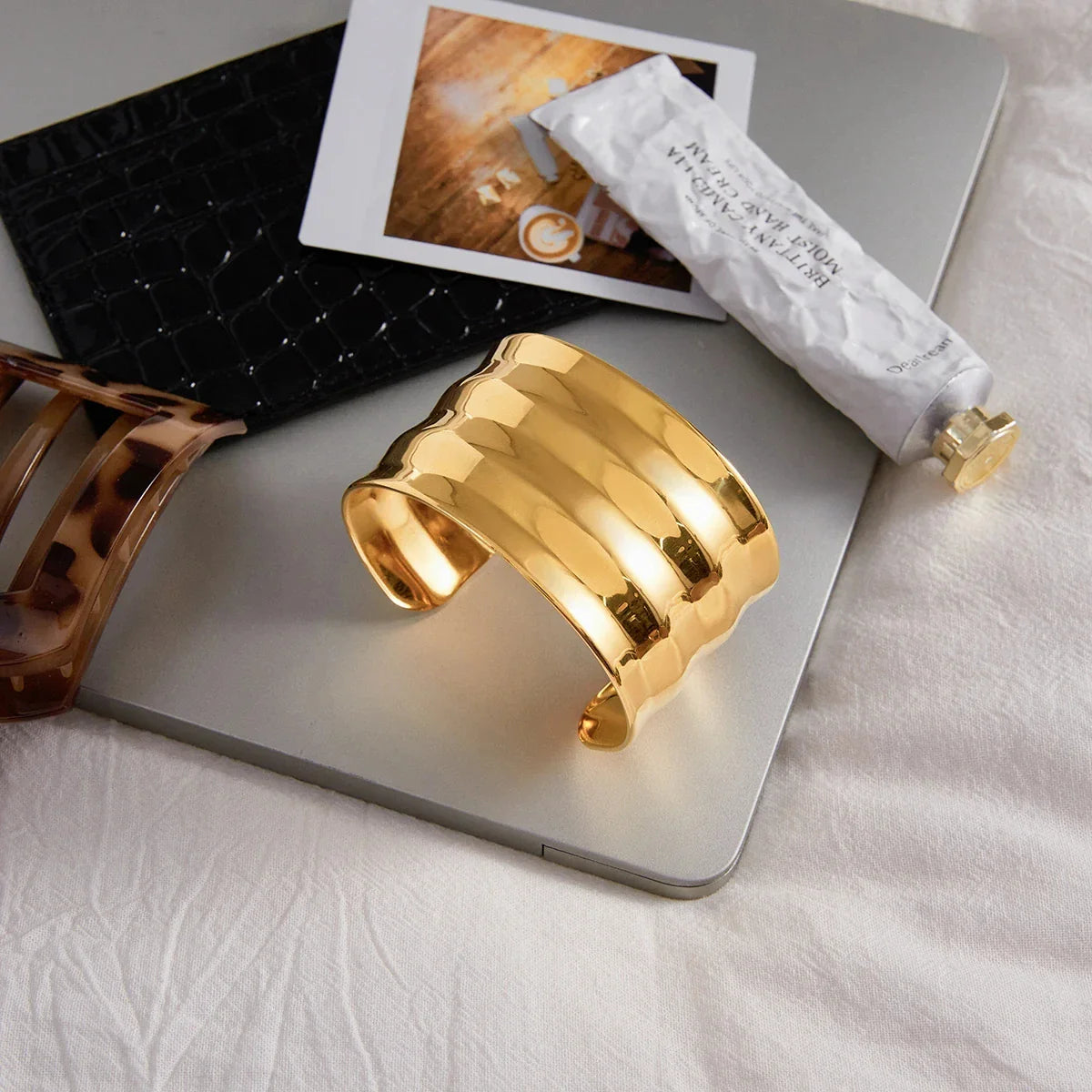 Waved statement bangle