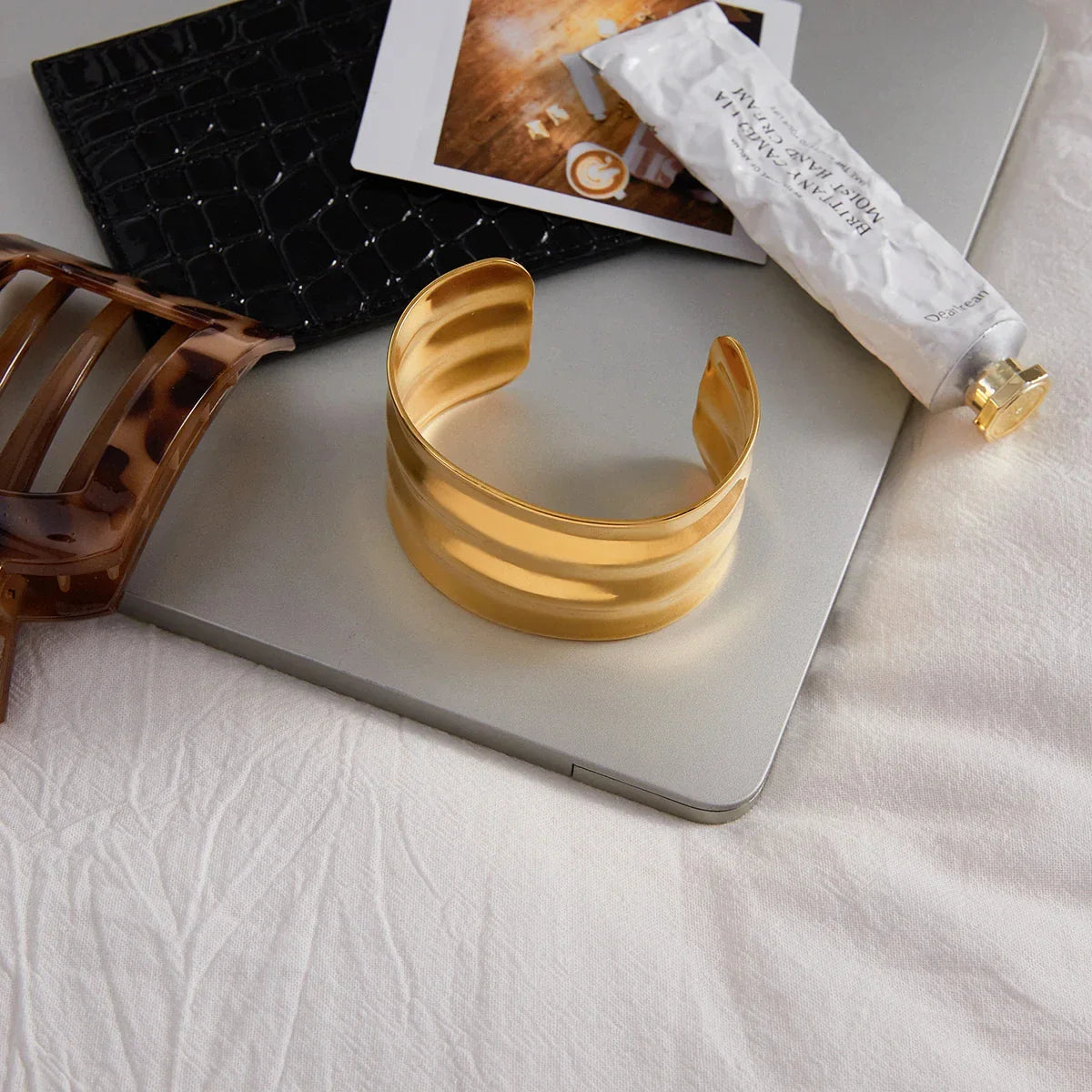 Waved statement bangle