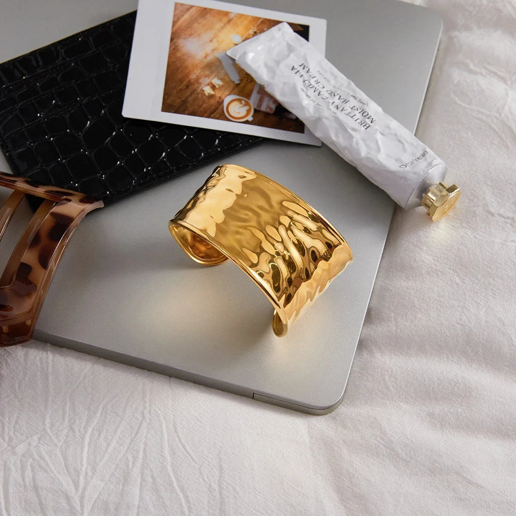 Waved statement bangle